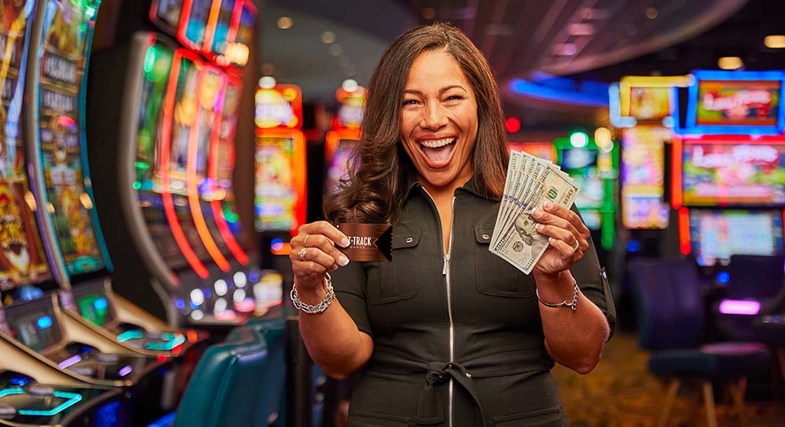 Woman Winning at Newport Racing & Gaming