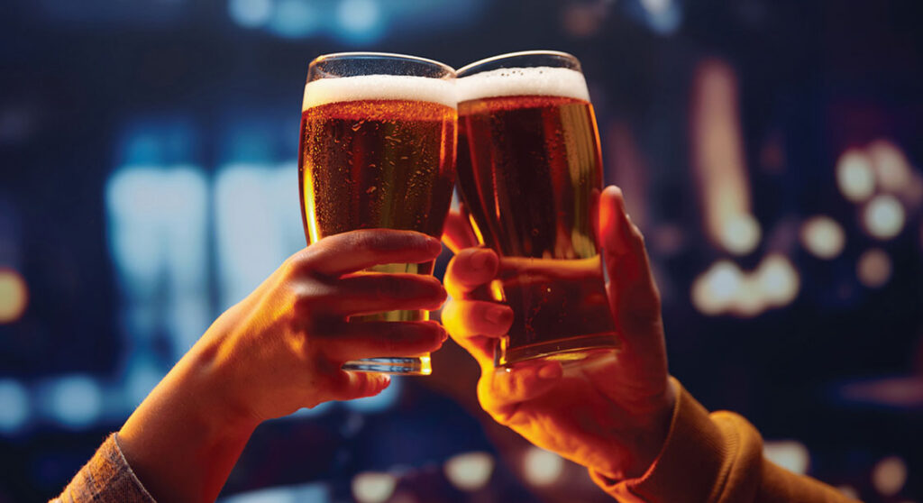 Cheering beers at Smiley's Bar & Grille at Newport Racing & Gaming